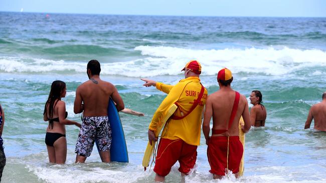 Surf lifesavers with the public. Picture: David Clark.