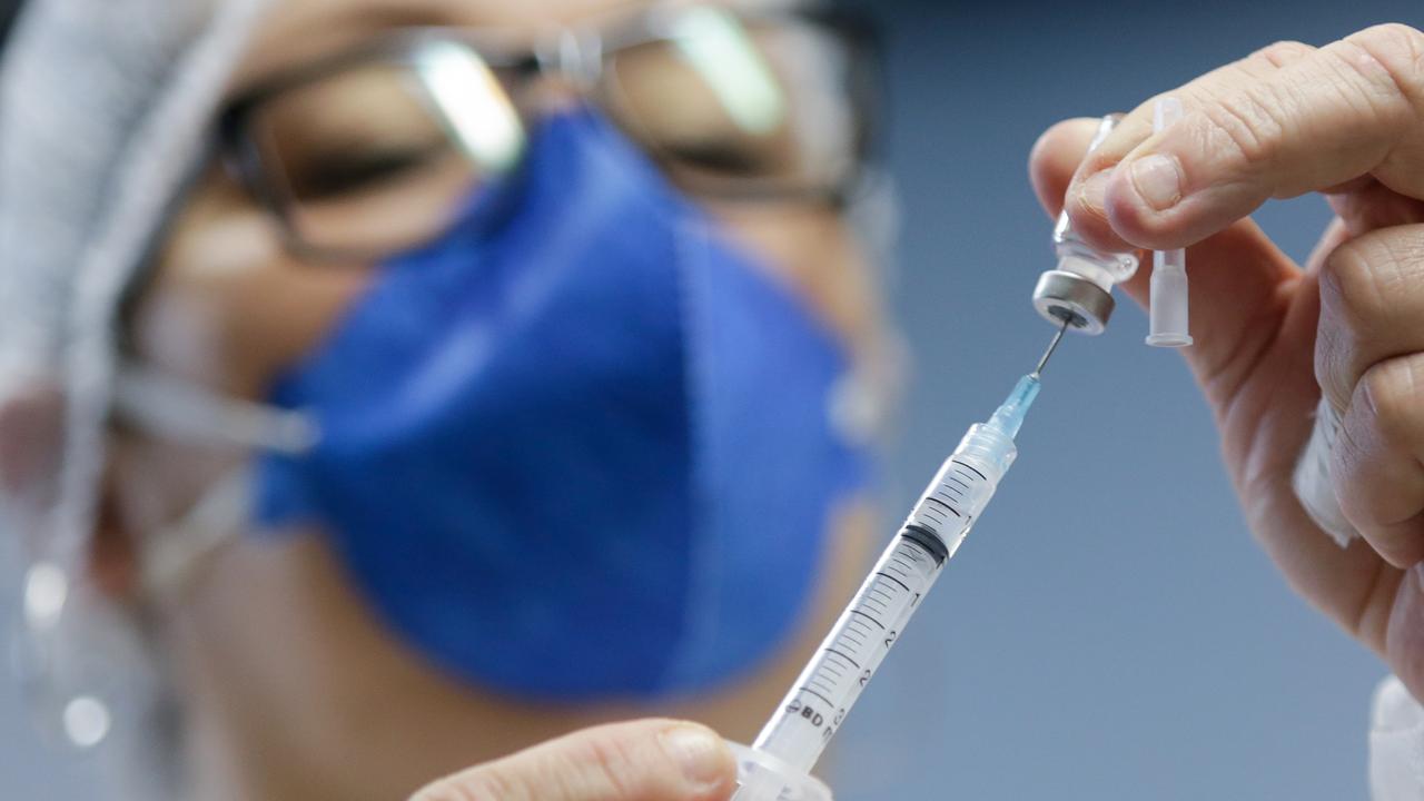 A healthcare worker prepares a dose of Sinovac Biotech Ltd vaccines. Picture: Getty Images