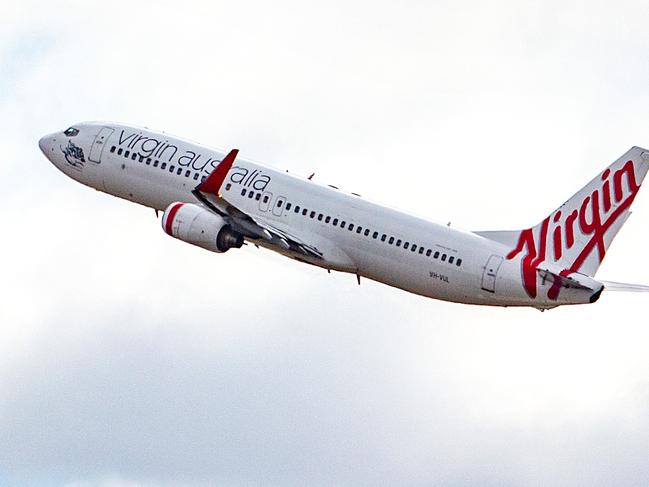 MELBOURNE, AUSTRALIA- NewsWire Photos APRIL 15 2021:  Virgin airline announce first International locations it will fly to from Australia once borders reopen. Virgin Flight takes off from Melbourne Airport.  Picture: NCA NewsWire / Sarah Matray