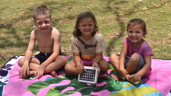 Young spectators Logan Ahern and Bella and Logan Blackman at Rockhampton Cricket's Country Carnival on January 25, 2025.