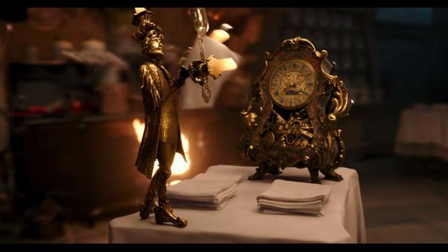 Lumiere and Cogsworth prepare for dinner.