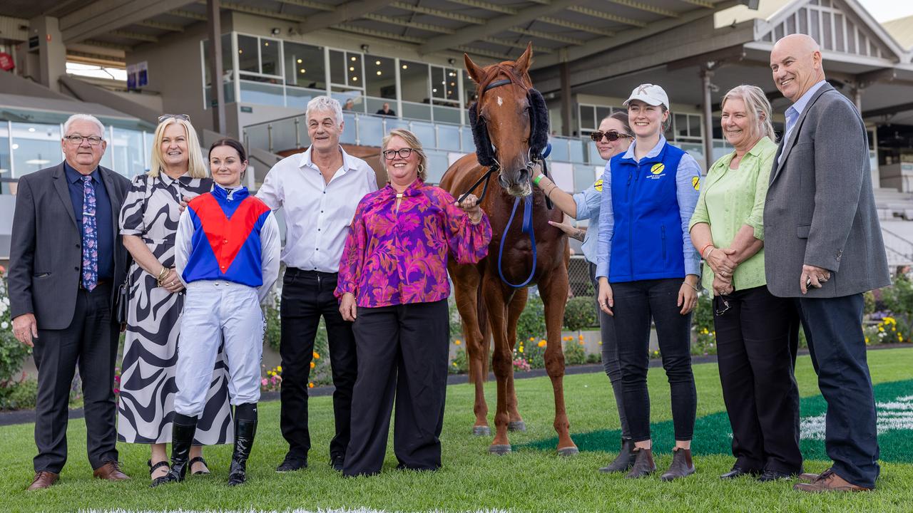 Teagan Voorham, Nicole Searle and connections pose with Sir Kingsford after the Port Adelaide Cup win at Morphettville on Saturday. Picture: Makoto Kaneko