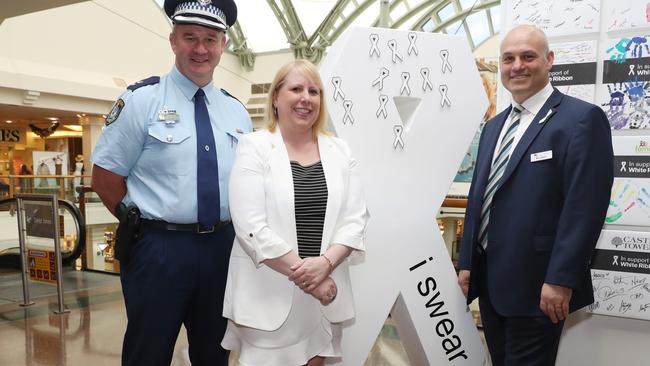 Hills LAC Superintendent Rob Critchlow, Hills Mayor Michelle Byrne and Hills Community Aid CEO Ben Jackson launching the White Ribbon campaign and exhibition at Castle Towers. Picture: David Swift