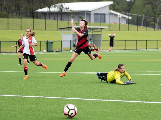 Caboolture Under 14 Div 1 Girls, first competitive match on all-weather pitch at Moreton Bay Central Sports Complex, Burpengary v Albany Creek. Picture MMM Photography