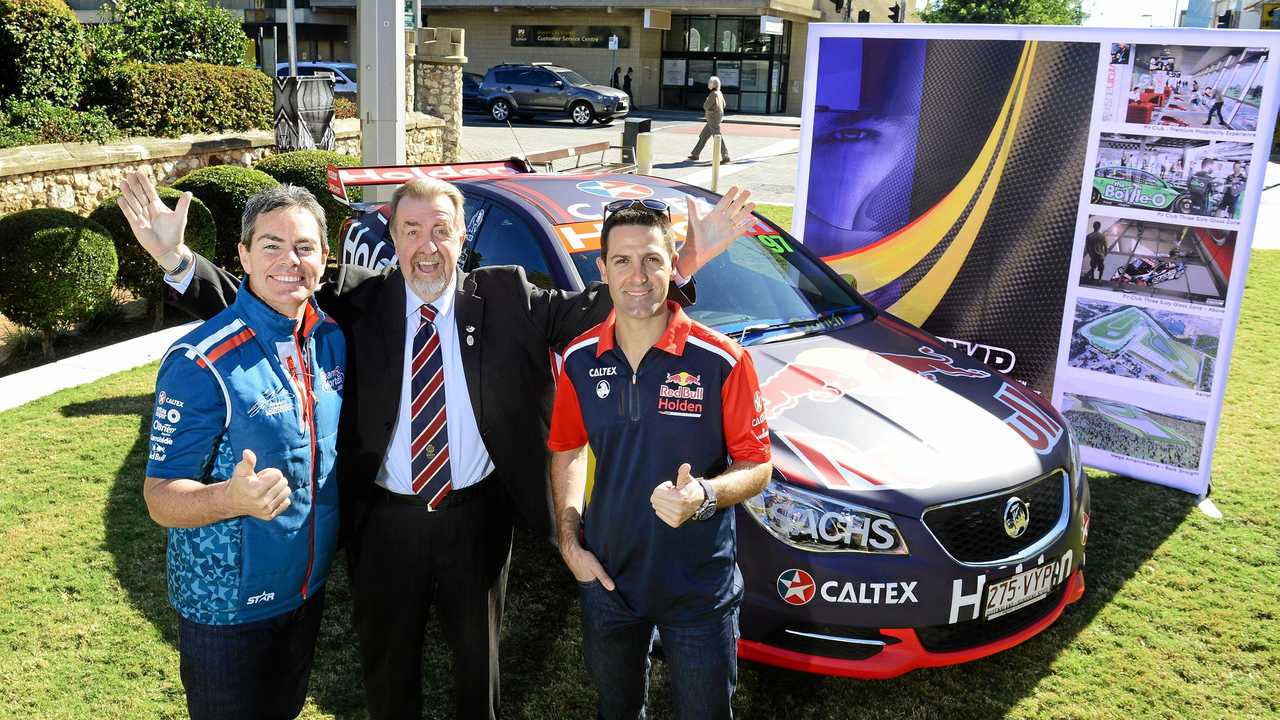 In this file photo Supercars Championship drivers Craig Lowndes and Jamie Whincup are seen here with dismissed Ipswich councillor Paul Tully. Picture: David Nielsen