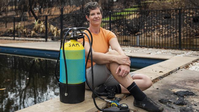 Samantha Kneeshaw submerged herself in her swimming pool at Lake Conjola for 10 minutes with her dive tank during the New Year’s Eve fire. Picture: Sean Davey