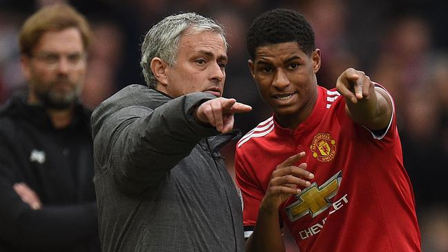 Manchester United manager Jose Mourinho gives some advice to young striker Marcus Rashford. Picture: AFP