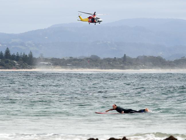 A search and rescue helicopter in Byron Bay as the search continues for missing backpacker Theo Hayez. The 18-year old Belgian national was last seen on May 31. Picture: AAP Image/Dave Hunt