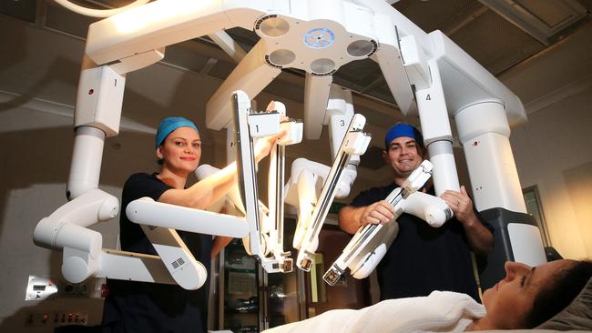 Dr Liz Jackson pictured with Theatre Technician Troy Wong. PICTURE: JUSTIN BRIERTY