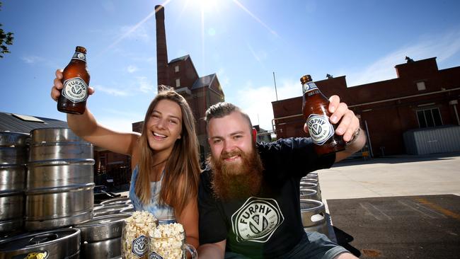 Hebe Drummond and Andrew McWilliam with some popcorn and Furphy's Refreshing Ale prepare for the Little Creatures outdoor cinema. Picture: Glenn Ferguson