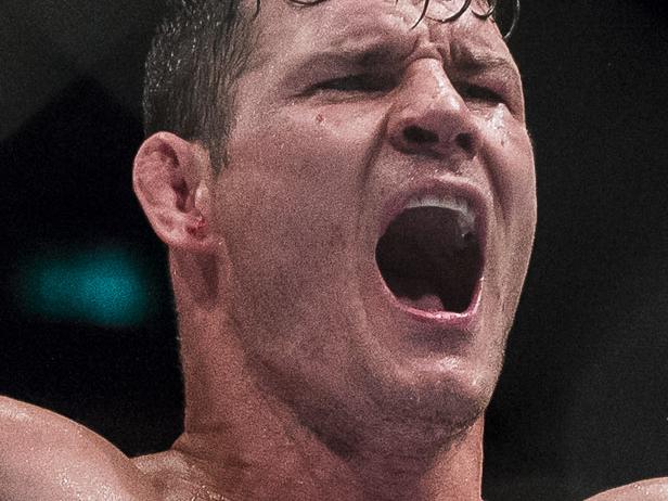 MACAU - AUGUST 23: Michael Bisping celebrates after winning his middleweight fight against Cung Le of USA during the UFC Fight Night at The Venetian Macao Cotai Arena on August 23, 2014 in Macau, China. (Photo by Victor Fraile/Getty Images) *** BESTPIX ***