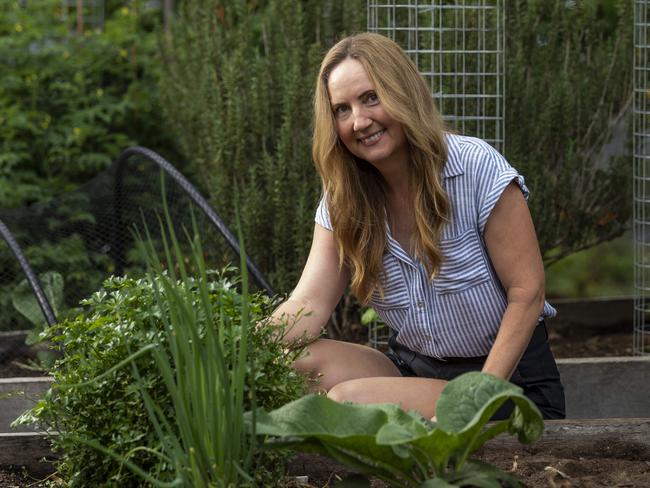 Christine Cronau has been hard at work planting a food garden from seed after seedlings were snapped up during panic buying. Picture: Mark Cranitch.