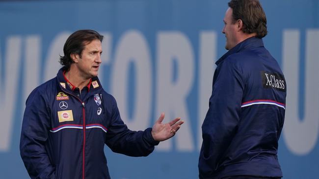 Luke Beveridge talking to Chris Grant at Western Bulldogs training last year. Picture: AAP Images