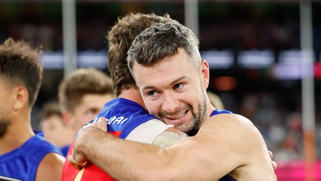 MELBOURNE, AUSTRALIA - SEPTEMBER 21: Conor McKenna of the Lions and Jarrod Berry of the Lions celebrate during the 2024 AFL Second Preliminary Final match between the Geelong Cats and the Brisbane Lions at The Melbourne Cricket Ground on September 21, 2024 in Melbourne, Australia. (Photo by Dylan Burns/AFL Photos via Getty Images)