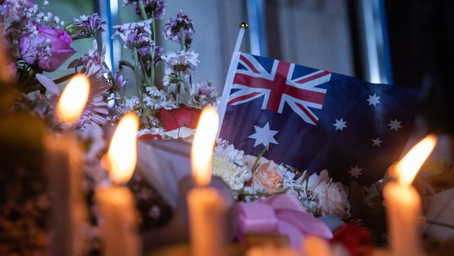 An Australian flag is seen during a commemoration ceremony of the 20th anniversary of the Bali bombings in Kuta on Wednesday. Picture: Getty Images