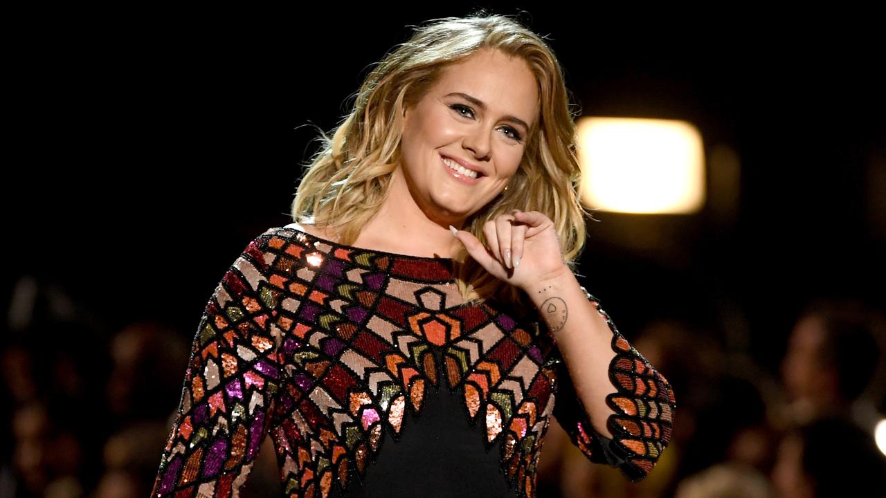 Adele is barely recognisable from previous photos after her successful weight loss. Picture: Kevin Winter/Getty Images for NARAS