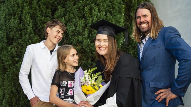 South Burnett Regional Council Cr Kirstie Schumacher celebrates her Bachelor of Communication and Media with son Decklan, daughter Grace and husband Wayne Schumacher at a UniSQ graduation ceremony at Empire Theatres, Tuesday, June 27, 2023. Picture: Kevin Farmer