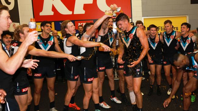 ADELAIDE, AUSTRALIA - APRIL 26: Jordon Sweet of the Power gets a Gatorade shower during the 2024 AFL Round 07 match between the Port Adelaide Power and the St Kilda Saints at Adelaide Oval on April 26, 2024 in Adelaide, Australia. (Photo by James Elsby/AFL Photos via Getty Images)