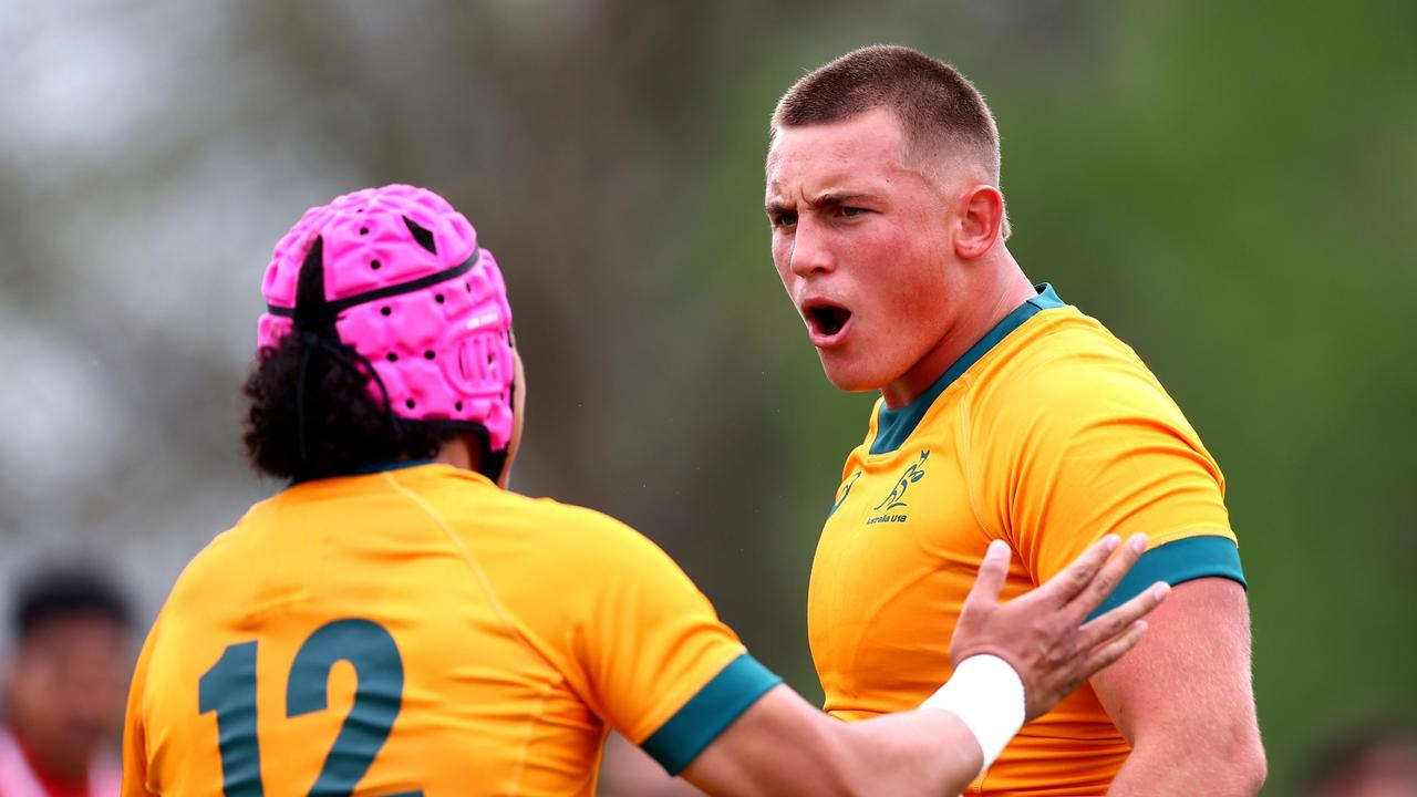 Kingsley Uys of Australia U18 (R) celebrates a try against New Zealand Barbarians in Hamilton, New Zealand. Picture: Getty Images for Rugby Australia