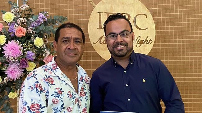 STUDENT EXCELLENCE: James Cook University Nguma-bada Spirit Award recipient, Cairns campus student Roderick Mabo (right) with Indigenous Education Research Centre Student Support Adviser Eddie Savage.