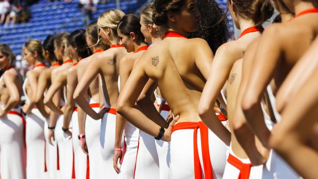 Grid girls line up after the qualifying session for the Formula One Grand Prix at the Monaco racetrack in Monaco. (AP Photo/Frank Augstein, FILE)