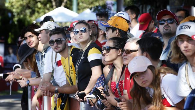 Crowds of fans wait for Formula One drivers at the Grand Prix. Picture: David Caird