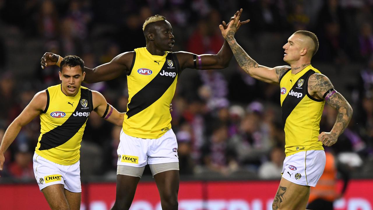 Sydney Stack, Mabior Chol and Dustin Martin at Marvel Stadium.