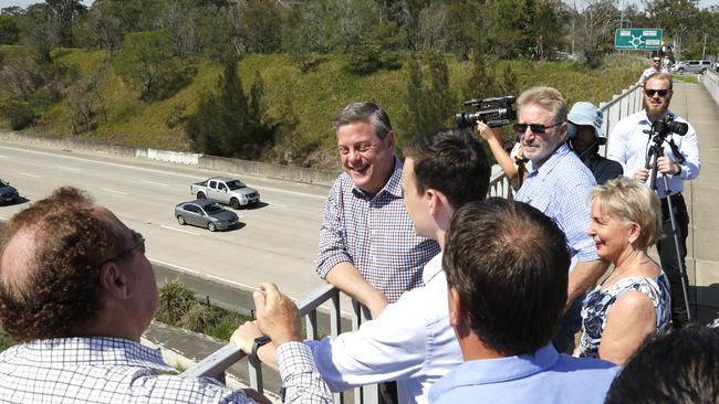 Queensland LNP leader Tim Nicholls speaks with Gold Coast candidates on the M1 in early November. Picture: AAP Image/Regi Varghese