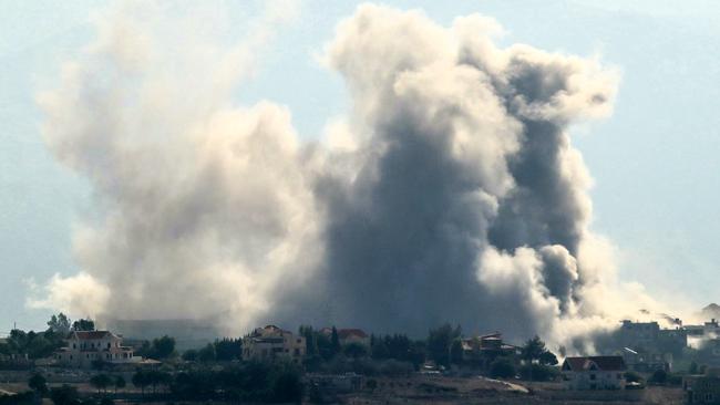 TOPSHOT - Smoke rises from the site of an Israeli airstrike that targeted the southern Lebanese village of Khiam on October 12, 2024. (Photo by Rabih DAHER / AFP)