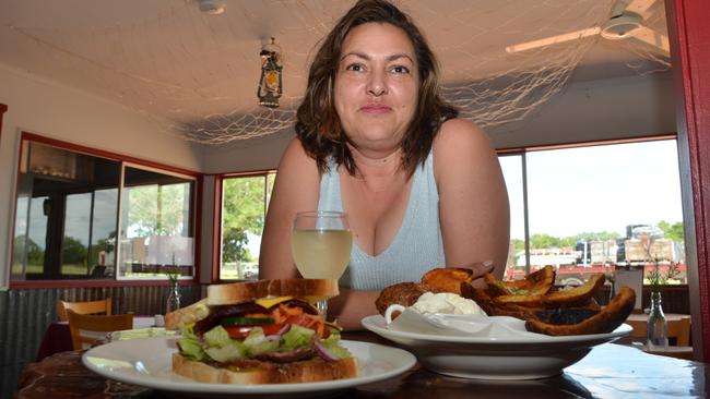 Priscilla Harrison in the bistro area with some of their new dishes. Mrs Harrison said she always keeps casserole in the fridge for truckies needing a feed outside kitchen hours.