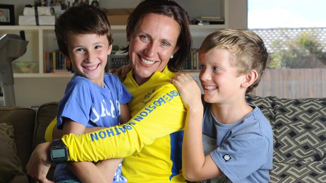 After returning from Boston in April, 2013, Anna Liptak is pictured happy at home with her children Lachy, then 7, and Zach, 9. Picture: Tricia Watkinson