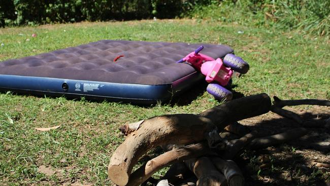 Residents in Nauiyu/Daly River have been forced to sleep in tents or on mattresses outside after gang violence forced them from their homes. Picture: Jason Wals