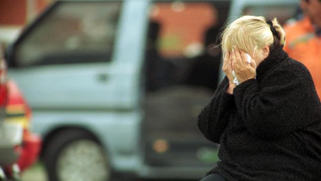 Judy Moran weeps at the murder scene of her son Jason Moran.