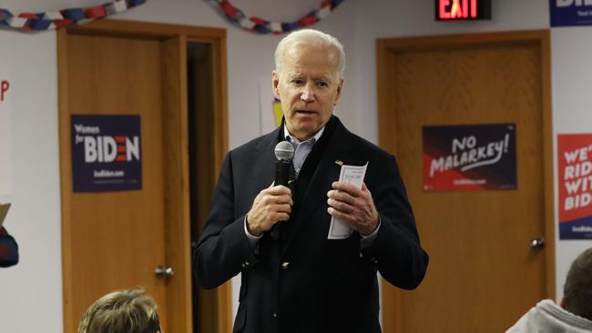 Joe Biden speaks to volunteers at his Iowa campaign headquarters. Picture: AFP