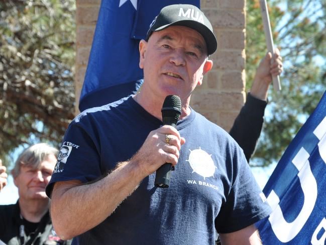 Unions including the CFMEU, UnionsWA and the Electrical Trades Union join MUA WA secretary Christy Cain (centre) for a rally opposite the WA parliament on Tuesday, August 25, 2015. They're against the free trade deal with China, saying it will be bad for local jobs and exploit foreign workers. (AAP Image/Rebecca Le May) NO ARCHIVING