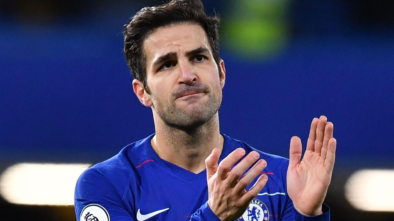 Chelsea's Spanish midfielder Cesc Fabregas applauds supporters after the draw with Southampton.