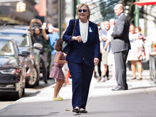 US Democratic presidential nominee Hillary Clinton leaves her daughter's apartment building after resting on September 11, 2016 in New York. Picture: AFP