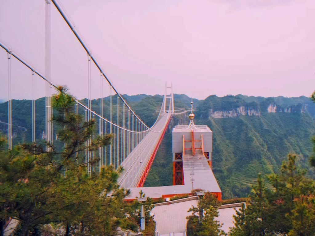 Aizhai – the world's highest suspension bridge – offers both stunning views and adrenaline-fuelled leaps for $290. Picture: iStock