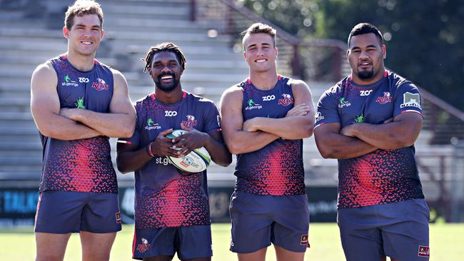 Reds players wearing club and school socks as grassroots rugby salute...set up for C-Mail only. Angus Scott-Young, Hamish Stewart, Moses Sorovi and   Taniela Tupou at Ballymore before team training.Pic Annette Dew