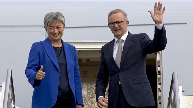 After being sworn The new Prime Minister, Anthony Albanese and the new Foreign Minister Penny Wong board the RAAF jet for the Quad meeting in Japan. Picture:NCA NewsWire / Andrew Taylor