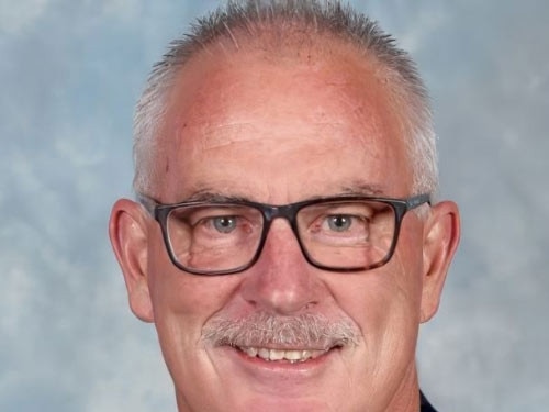 Catholic school communities are mourning the death of principal Paul Hogan.