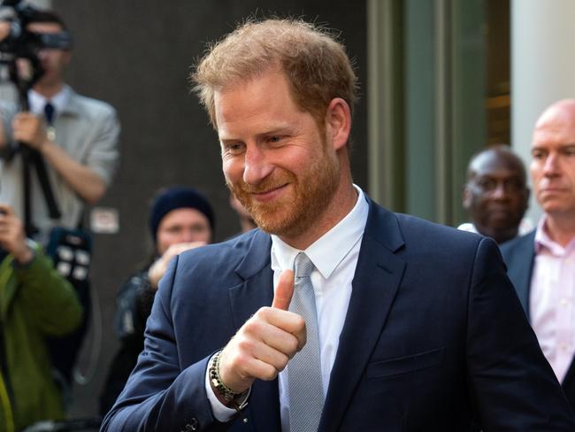 LONDON, ENGLAND - JUNE 7: Prince Harry, Duke of Sussex, gives a thumbs up as he leaves after giving evidence at the Mirror Group Phone hacking trial at the Rolls Building at High Court on June 7, 2023 in London, England. Prince Harry is one of several claimants in a lawsuit against Mirror Group Newspapers related to allegations of unlawful information gathering in previous decades. (Photo by Carl Court/Getty Images)