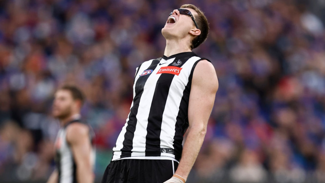 MELBOURNE, AUSTRALIA - JUNE 13: Mason Cox of the Magpies reacts after missing a goal during the round 13 AFL match between the Collingwood Magpies and the Melbourne Demons at Melbourne Cricket Ground on June 13, 2022 in Melbourne, Australia. (Photo by Darrian Traynor/Getty Images)