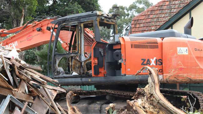 An excavator was destroyed by fire at a house demolition site in Lockleys Picture Dean Martin