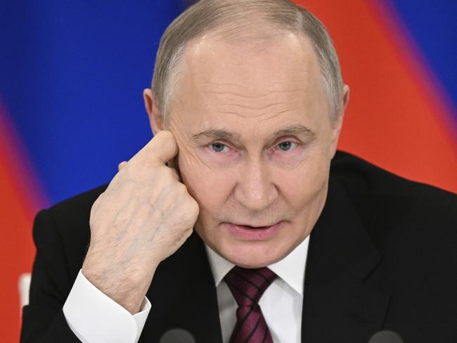 Vladimir Putin speaks to journalists in the Grand Palace at the Kremlin in Moscow. Picture: Sergei Bobylev/Photo host agency RIA Novosti via AP