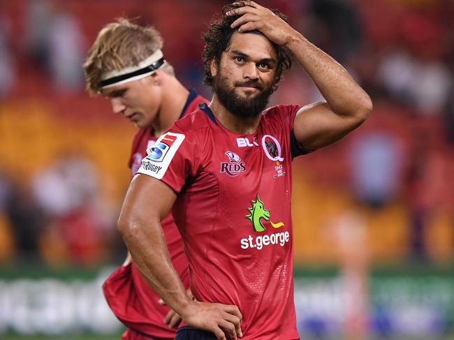 Reds player Karmichael Hunt is dejected following the 3rd round Super Rugby match between the Queensland Reds and the Canterbury Crusaders at Suncorp Stadium in Brisbane, Saturday, Mar. 11, 2017. (AAP Image/Dave Hunt) NO ARCHIVING, EDITORIAL USE ONLY