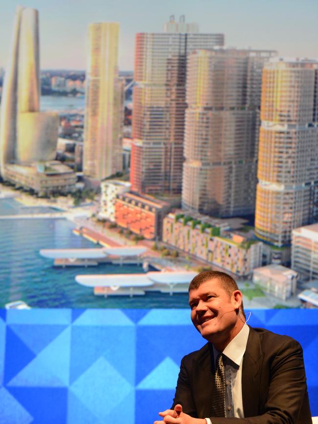 James Packer speaking in 2013 in front of an artist’s impression of the winning design for his Crown Casino Barangaroo development, seen at upper left and now completed. Picture: AAP