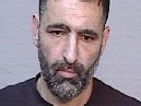 Michael Sahartor, also known as Hassan Saleh, 41, is wanted on an outstanding warrant for more than 40 alleged malicious damage-related offences across Kingsgrove on September 15.