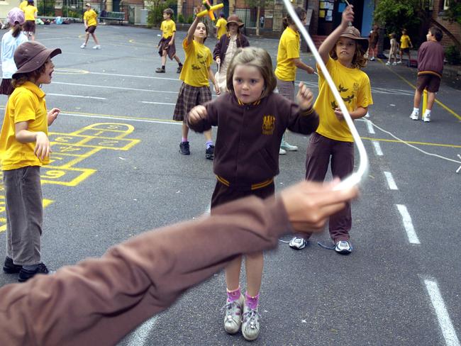 Help your child by teaching them playground games. Picture: Craig Wilson