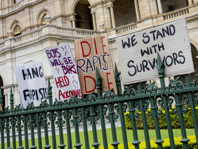 Brisbane, AUSTRALIA - NewsWire Photos March 15, 2021: Protest signs are left of the fence of QueenslandÃs Parliament House after thousands of women took to the streets of Brisbane to ÃMarch 4 JusticeÃ a nationwide Australian womenÃs movement, demanding justice and action against gendered violence and widespread change in workplaces and in our political and criminal justice systems. : NCA NewsWire / Sarah Marshall